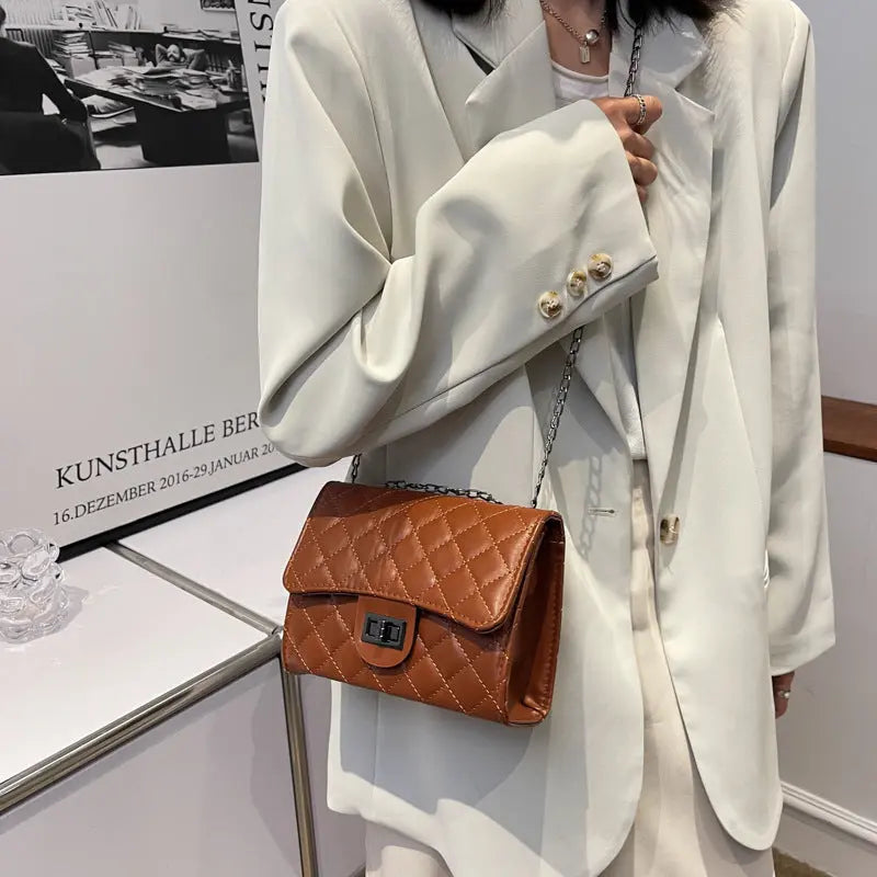 Bolso de hombro para mujer nuevo estilo coreano de moda temperamento cuadrado simple mensajero de un solo hombro bolso cuadrado pequeño textura eprolo