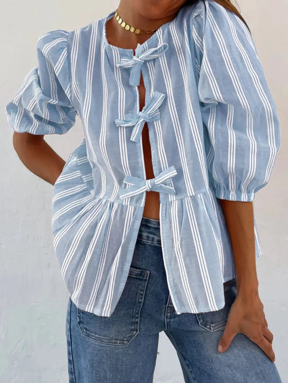 Camisa con manga globo y cuello redondo atado eprolo