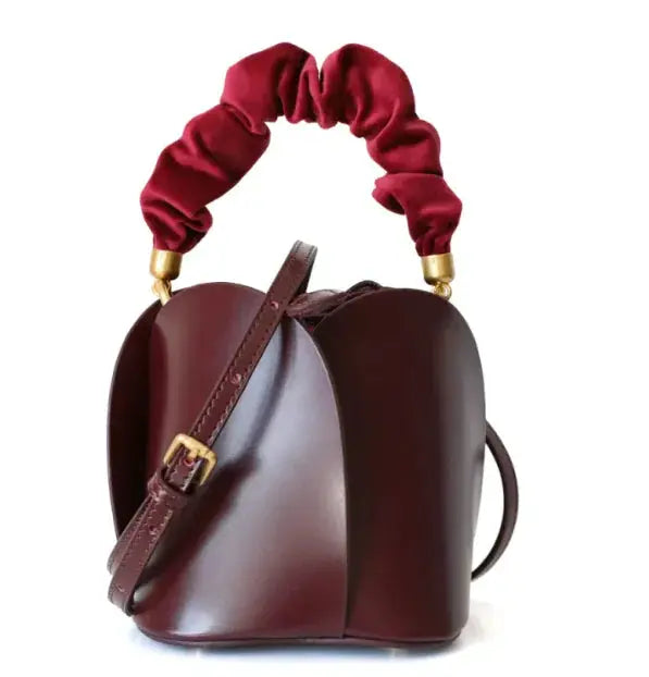 Bolso tipo bombonera con flores Skinluminova