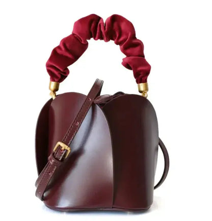 Bolso tipo bombonera con flores Skinluminova