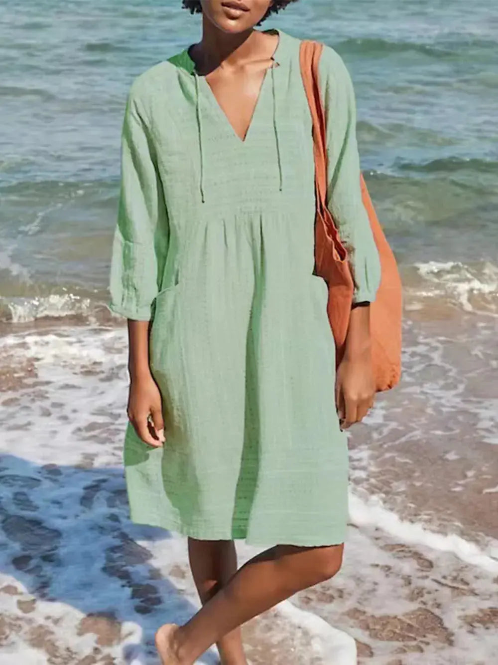Vestido casual holgado con cuello en V y bolsillos eprolo