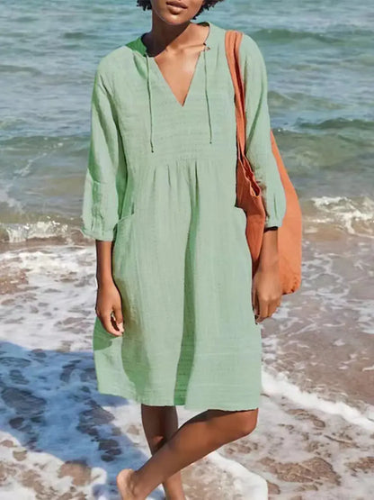 Vestido casual holgado con cuello en V y bolsillos eprolo