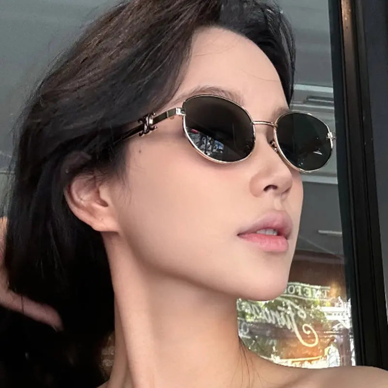 Gafas de sol ovaladas retro, nuevo protector solar personalizado de moda y gafas de sol resistentes a los rayos UV para mujer eprolo