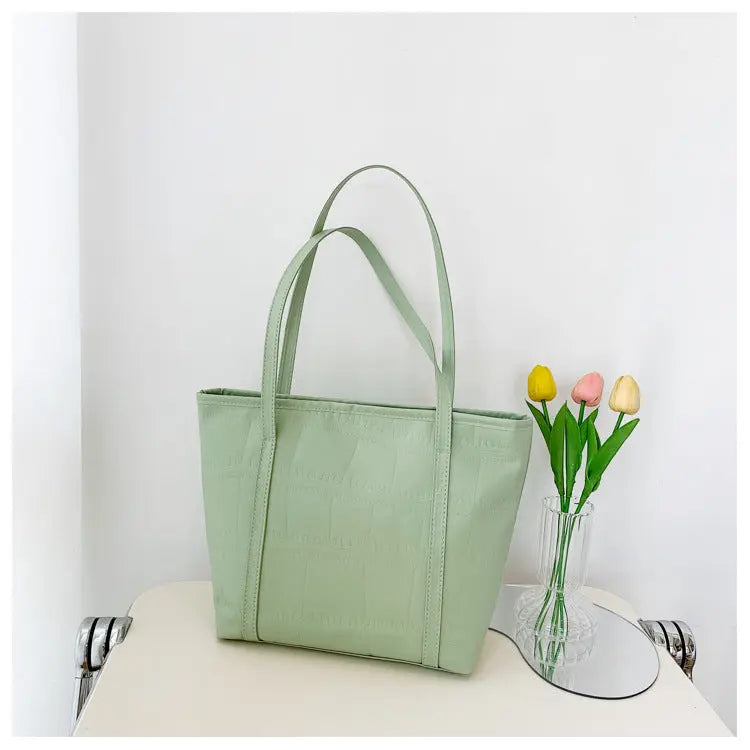 Bolso grande de verano para mujer Nueva versión coreana Bolso de hombro casual de gran capacidad Textura Bolso de mano de color sólido eprolo