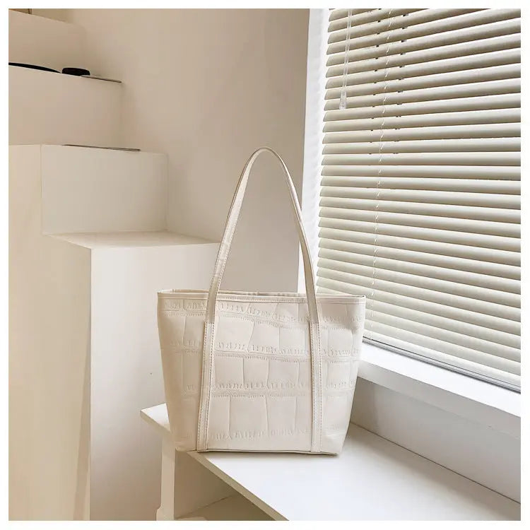 Bolso grande de verano para mujer Nueva versión coreana Bolso de hombro casual de gran capacidad Textura Bolso de mano de color sólido eprolo
