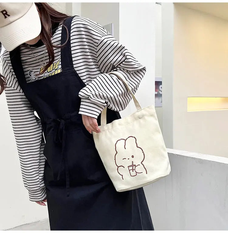 Ins Bolso de Lona Con Estampado De Oso Japonés Femenino Nueva Moda Pequeño Fresco Bolso de Mano de Clase Estudiantil eprolo