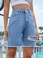 Pantalones cortos de mezclilla con dobladillo crudo desgastado eprolo