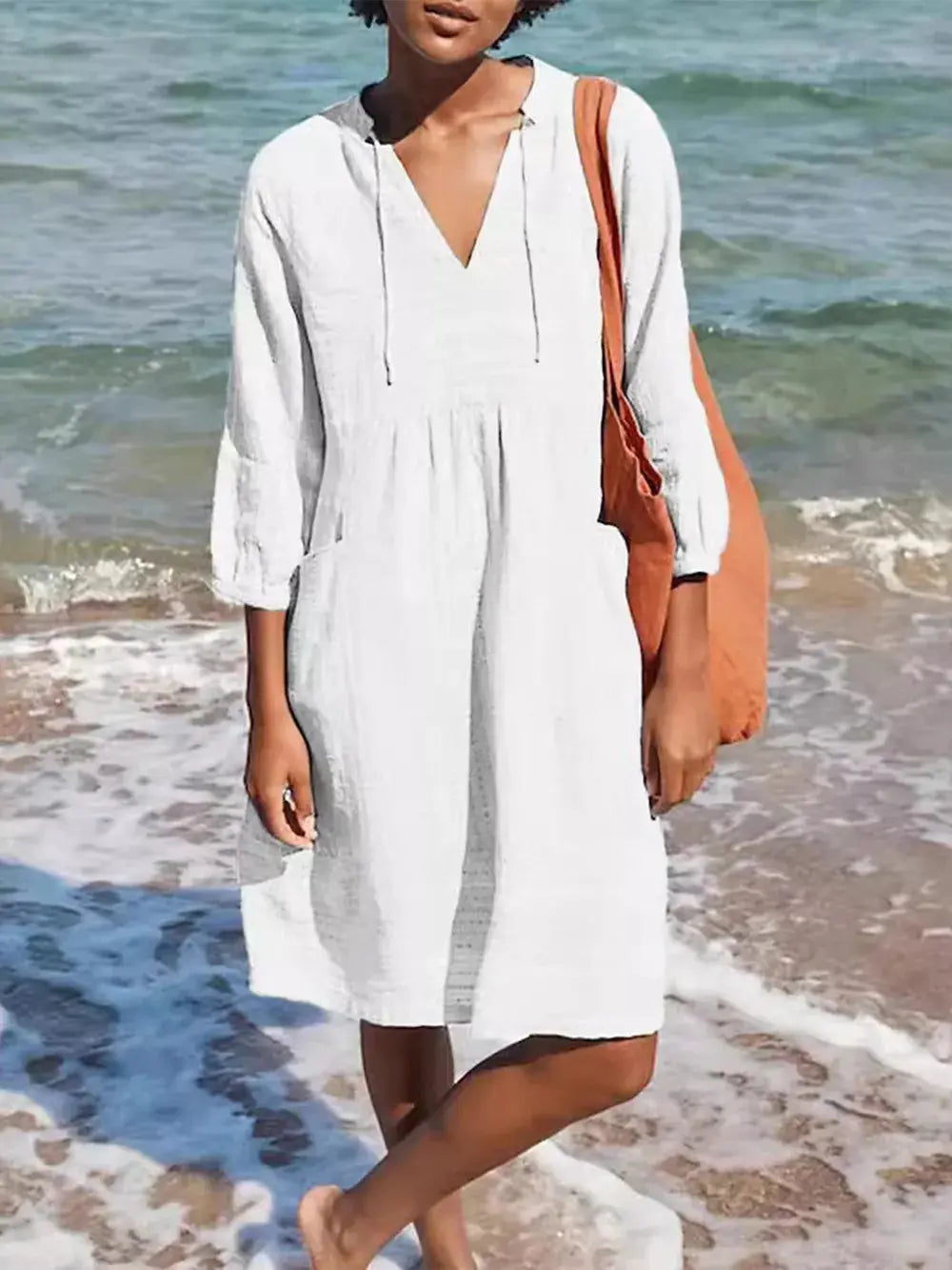 Vestido casual holgado con cuello en V y bolsillos eprolo