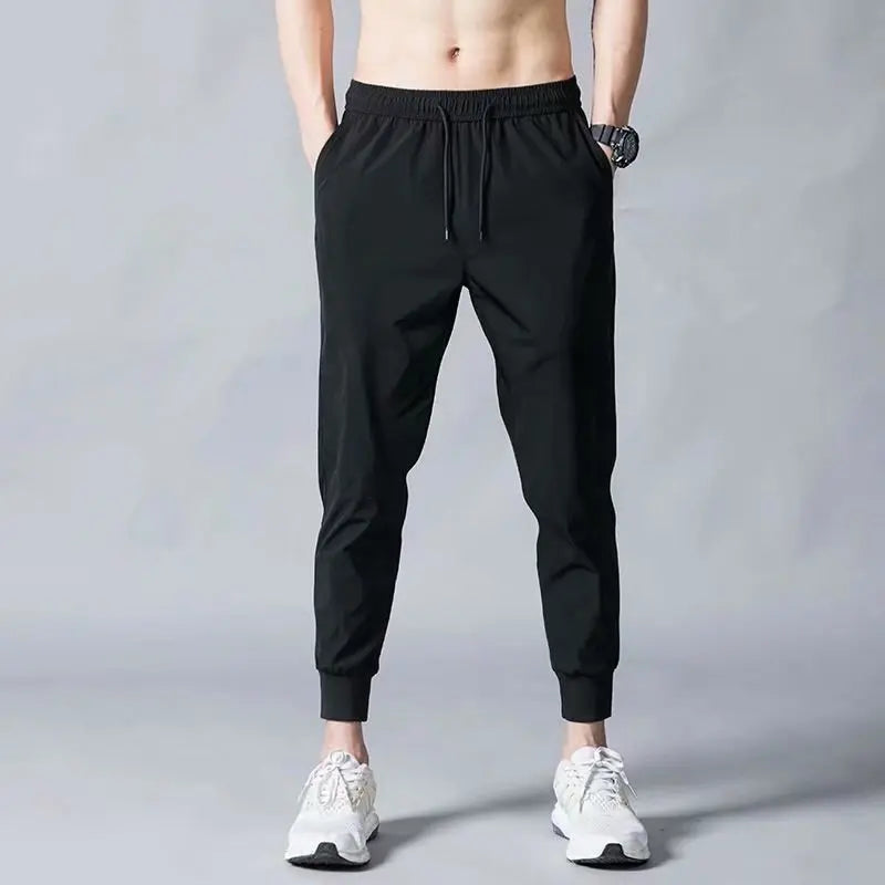 Pantalones finos de seda de hielo para hombres, hombres de negocios, pantalones casuales, pantalones deportivos holgados de pierna recta de moda eprolo