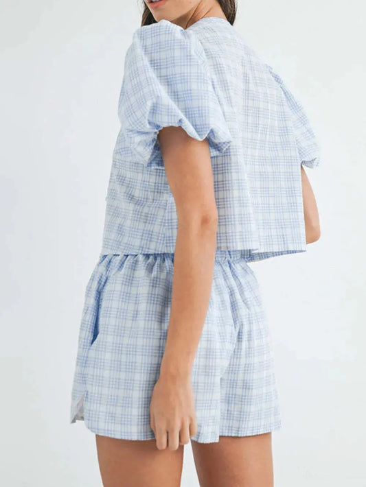 Conjunto de top y pantalones cortos con mangas abullonadas y cuello en V eprolo