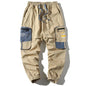 Pantalones cargo con bloques de color y bolsillos grandes Skinluminova