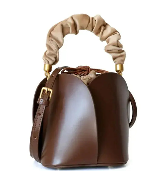 Bolso tipo bombonera con flores Skinluminova