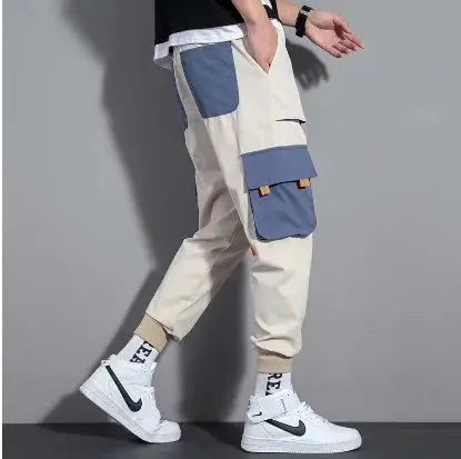 Pantalones cargo con bloques de color y bolsillos grandes Skinluminova